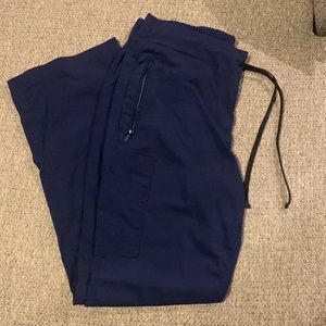 2 pairs of navy motion by Barco scrubs bottoms